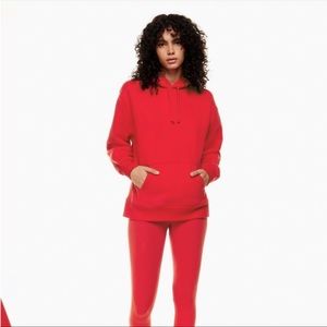 TNA CozyAF fleece perfect pullover hoodie in Flashing Red Cozy kangaroo pocket